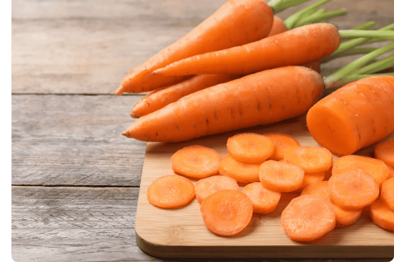 Sliced carrots on the wooden board